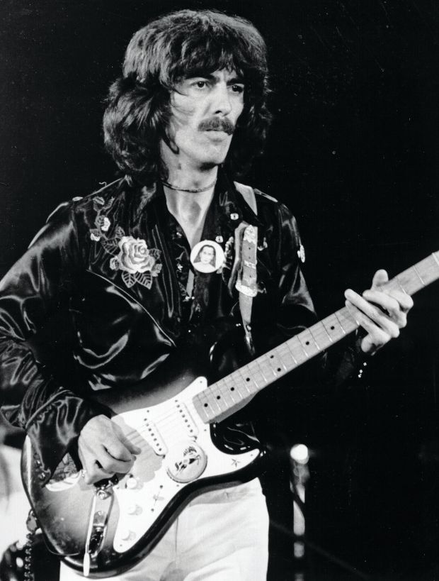 Harrison's 15 Greatest Guitar Moments After The Beatles Pro